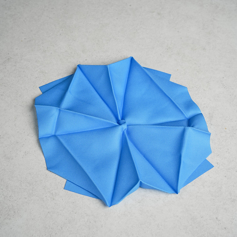 Peti Peto Self-Folding Origami Cloth with Shape Memory